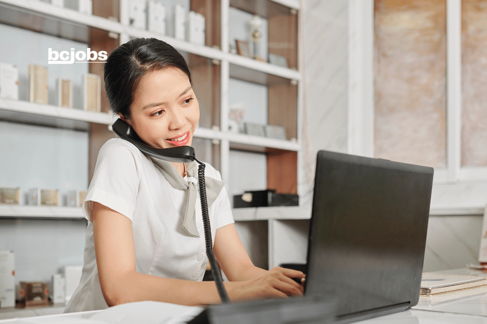 woman talking on a telephone